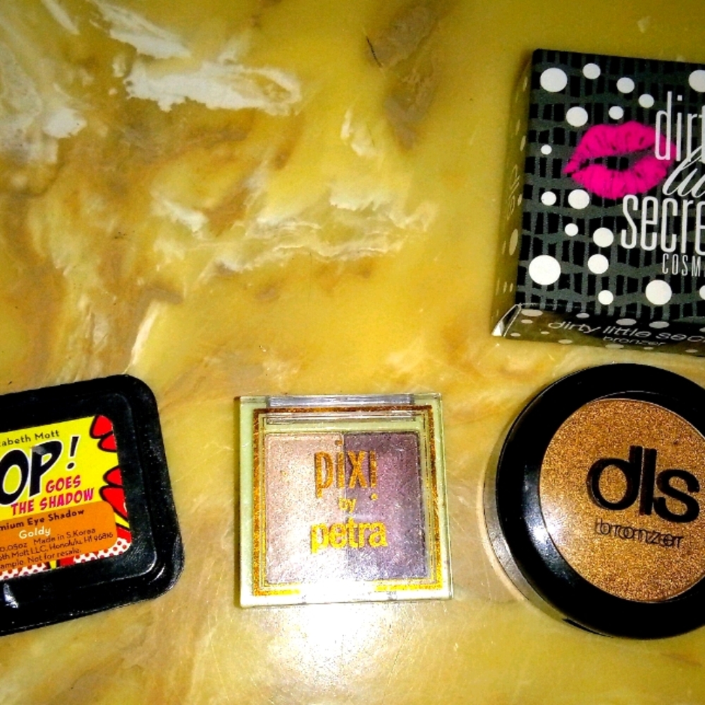 3 shimmery gold, bronze eye shadows & bronzer